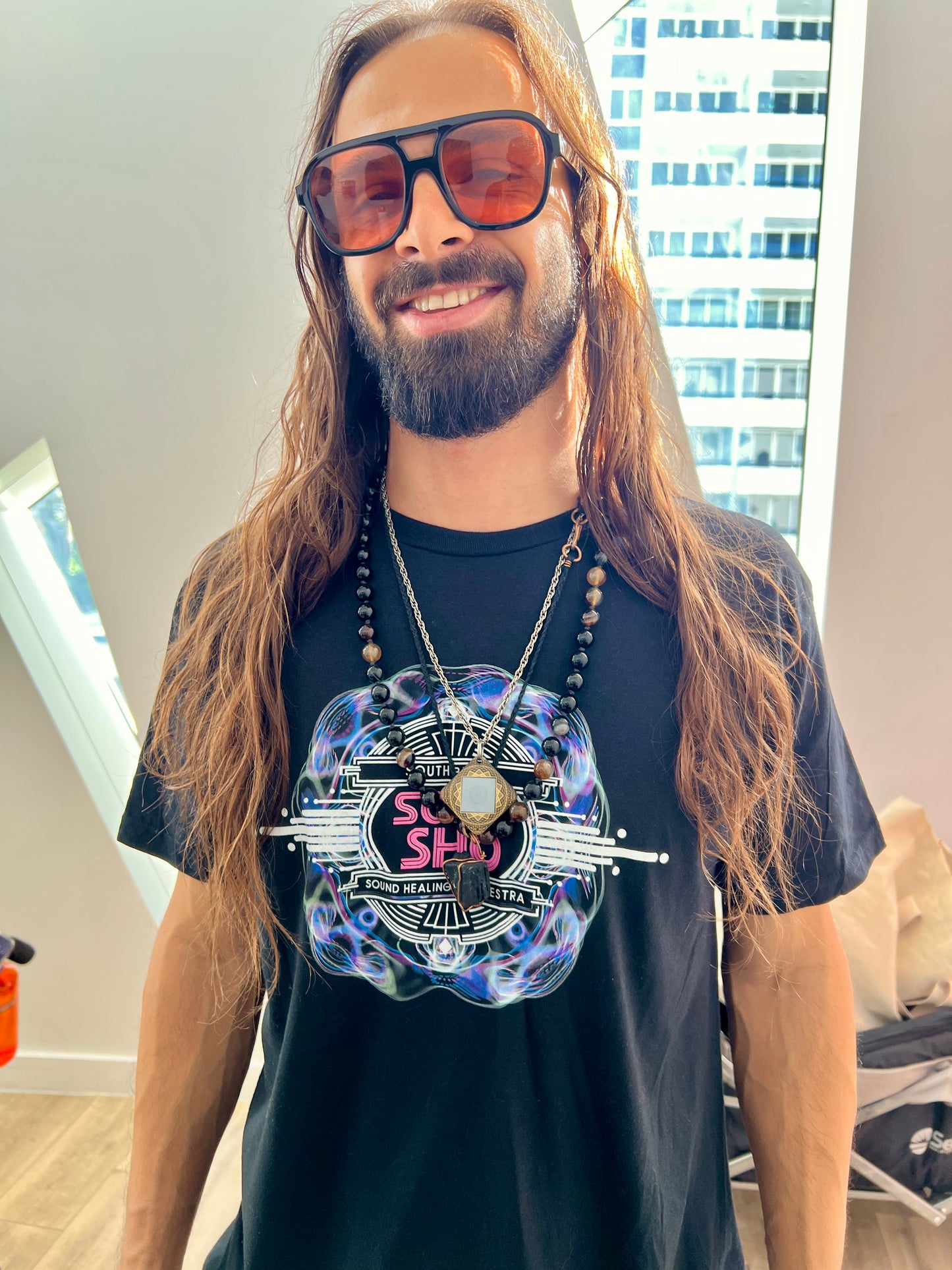 Retro Resonance Unisex Softstyle T-Shirt, Cosmic Vibe Graphic Tee for Soundhealing, Yoga, Mediation, Festivals, Music Lovers Tee